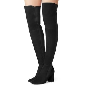 mid thigh black boots